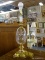 (R2) TABLE LAMP; CUT CRYSTAL AND BRASS TABLE LAMP. COMES WITH BULB BUT MISSING SHADE. MEASURES 24