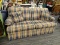 (R4) FLEXSTEEL SOFA; 2-CUSHION SOFA WITH A PLAID PATTERNED UPHOLSTERY. COMES WITH ARM COVERS AND 2