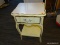 (R4) FRENCH PROVINCIAL SIDE TABLE; CREAM PAINTED, SINGLE DRAWER SIDE TABLE WITH A LOWER SHELF AND