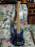 (R2) HARMONY ELECTRIC GUITAR; MINIATURE ELECTRIC GUITAR WITH BLUE ACRYLLIC BASE. MISSING A STRING.