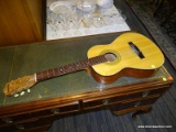 (R2) DECCA ACOUSTIC GUITAR WITH A STEEL REINFORCED NECK. THE [A] OR 2ND STRING NEEDS TO BE REWIRED.