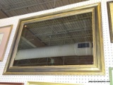 (WALL) WALL MIRROR; FRAMED, RECTANGULAR, WALL HANGING MIRROR WITH A WORN GOLD TONED FRAME. MEASURES