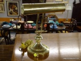 (R2) DESK LAMP; POLISHED BRASS DESK LAMP WITH AN ADJUSTABLE ANGLE HEAD. MEASURES AT MAX 12.75