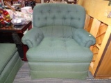 (R2) ARMCHAIR WITH OTTOMAN; CUSHIONED, ROLLED ARM, BUTTON TUFTED ARM CHAIR WITH A ROLLING OTTOMAN.