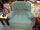 (R2) ARMCHAIR; CUSHIONED, ROLLED ARM, BUTTON TUFTED ARM CHAIR WITH A GREEN BASE COLOR UPHOLSTERY