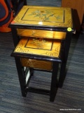 (R2) NESTING TABLE; 2 PIECE SET OF BLACK FINISHED NESTING TABLES WITH A GOLD TONED TOP AND A FLORAL