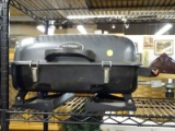 (R4) BLUE RHINO PORTABLE GAS GRILL WITH FOLDING LEGS AND A LATCHING LID. MODEL NO. GBT10039L.