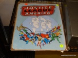 (R4) RETRO JUSTICE LEAGUE OF AMERICA TIN WALL SIGN. MEASURES 12.5