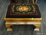 (WALL) FOOT STOOL; FLORAL NEEDLEPOINT UPHOLSTERED STOOL WITH AN OAK FRAME AND CABRIOLE LEGS.