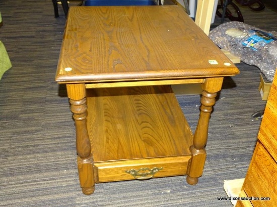 (R1) SIDE TABLE; OAK SIDE TABLE WITH A LOWER SHELF, LOWER DRAWER, AND URN SHAPED LEGS. MEASURES