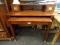 (R3) DESK WITH HUTCH AND ROLL OUT EXTENSION; MAHOGANY FINISHED DESK WITH 2 DRAWERS ON THE HUTCH AND