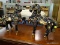 (R3) PAIR OF PORCELAIN HORSES; 2 PIECE SET OF BLACK PAINTED PORCELAIN HORSES WITH GOLD TONED AND