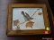 (R3) K WOODLE PRINT ON CANVAS; FRAMED PRINT DEPICTS A BIRD TRYING TO CATCH A BUG ON A THIN MAPLE
