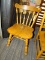 (R4) SIDE CHAIR; WOODEN, ROUND AND TURNED BANNISTER BACK SIDE CHAIR WITH TURNED LEGS AND AN H