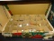 (SHELVES) ORNAMENT BOX LOT OF ASSORTED ORNAMENTS; BOX INCLUDES ABOUT 23 ASSORTED BALL ORNAMENTS.