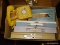 (SHELVES) BOX LOT; INCLUDES 3 METAL BOXES, BAKELITE GLASSES WITH SPARE LENSES, A ROTARY PHONE, AND A