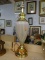 (SHELVES) TABLE LAMP; LIGHT BROWN COLORED, REEDED GLASS TABLE LAMP WITH A POLISHEDBRASS TOP AND