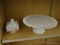 (SHELVES) MILK GLASS DISHES; 2 PIECE LOT TO INCLUDE A CAKE PLATE WITH RIBBON RIM AND HOBNAIL BASE