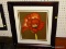 (LWALL) WATERCOLOR PRINT; FLORAL WATERCOLOR PRINT OF A CLOSE UP ON A RED FLOWER. SITS IN A MAHOGANY