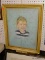 (LWALL) FRAMED CHILD PORTRAIT; DEPICTS A PORTRAIT OF A YOUNG BLONDE HAIRED BOY ON A BLUE BACKGROUND.