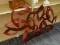 (LWALL) RED COLORED METAL WALL ART WITH MARQUISE SHAPED PIECES. MEASURES 44