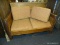 (R2) KID'S ROOM LOVESEAT; RUSTIC LOVESEAT WITH A SOLID OAK FRAME AND REDDISH UPHOLSTERED CUSHIONS.