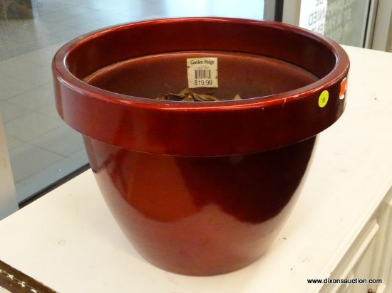 (R1) GARDEN RIDGE, RED FINISHED COMPOSITE PLANTER. MEASURES 11.5" TALL WITH A 13.25" DIAMETER.