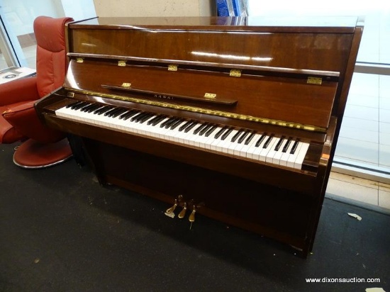 (R1) KAWAI UPRIGHT PIANO. SERIAL NUMBER K491958. MEASURES 57" X 23" X 42". ALL THE KEYS WORK.