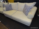 (R2) ROLL ARM SOFA - IVORY; UPHOLSTERED, 2-CUSHION SOFA WITH ESPRESSO TAPPERED BLOCK LEGS. MEASURES