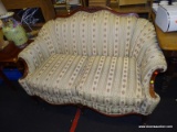 (R4) FRENCH PROVINCIAL CAMELBACK LOVESEAT; ROLLING ARM FRENCH PROVINCIAL STYLE LOVESEAT WITH SHELL