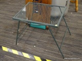 (R4) PATIO SIDE TABLE; GREEN FINISHED, WROUGHT IRON PATIO TABLE WITH A WIRE TOP. MEASURES 18.5