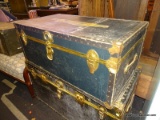(R4) VINTAGE TRUNK; GREEN TONED, LATCHING TRUNK ITH BRASS FINISHED AND LEATHER BINDINGS. MEASURES