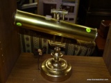(R4) DESK LAMP; POLISHED BRASS WITH AN ADJUSTABLE HEAD. MEASURES 16