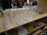(SHELVES) SHELF LOT OF ASSORTED GLASSWARE; LOT TO INCLUDE ASSORTED WINE GLASSES, CORDIAL GLASSE,