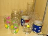 (SHELVES) LOT OF GLASSWARE; 12 PIECE LOT TO INCLUDE 8 ROCKS GLASSES, 3 PLASTIC CUPS, AND A PINT