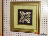 (LWALL) FRAMED ART; SILVER PAINTED FLORAL LEAF SHAPE SITTING IN A GREEN MAT AND A BRONZE TONED