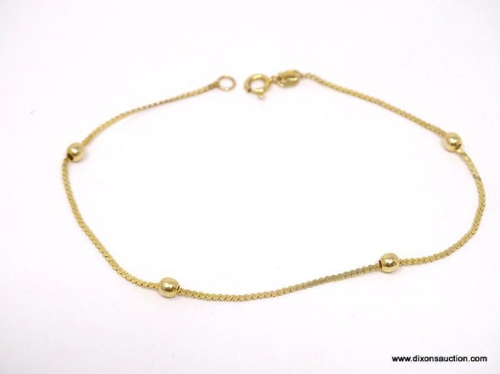 14K YELLOW GOLD BRACELET WITH 14K YELLOW GOLD BEADED BALLS. MEASURES APPROX. 7" LONG & WEIGHS