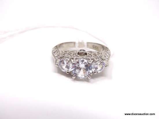 .925 STERLING SILVER OVER COPPER FILIGREE ENGAGEMENT RING. FEATURES (3) WHITE SAPPHIRES. APPROX.