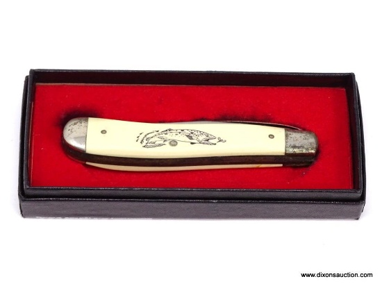 SCHRADE SCRIMSHAW TRAPPER KNIFE IS A 3 7/8" CLOSED TROUT & SMALL GAME LOCK BLADE WITH STEEL SKINNING