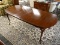 CHERRY HICKORY CHAIR COMPANY QUEEN ANNE OVAL DINING TABLE WITH 2 LEAVES. MEASURES APPROX. 64