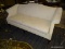 PAUL ROBERT CHAIR COMPANY QUEEN ANNE OFF-WHITE DESIGNER SOFA. MEASURES APPROX. 72