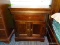 (R3) CHARLISLE COLLECTION DARK WOOD ONE DRAWER NGHTSTAND WITH CABINET BOTTOM. SHIELD STYLE PULLS.