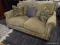 (R4) ASHLEY FURNITURE ZARINA COLLECTION UPHOLSTERED LOVESEAT. RICHLY TRADITIONAL ROLL ARMS ARE GIVEN