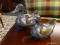 (R4) PAIR OF CAST METAL DUCK COVERED DISHES WITH BRASS DECORATION. BOTH ARE DIFFERENT SIZES. MARKED