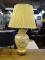 (R4) YELLOW FLORAL GINGER JAR CONVERTED TO A LAMP WITH PIERCED BRASS FEET. COMES WITH SHADE &