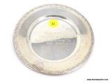 INTERNATIONAL STERLING PRELUDE PATTERN SAUCER WITH FLORAL EMBOSSED RIM. ENGRAVED WRITING IN THE