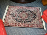 HANDMADE ORIENTAL RUG. APPROX. 4' X 6'.