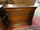 MAHOGANY THREE DRAWER NIGHTSTAND WITH SHIELD STYLE PULLS. HIDDEN DRAWER AT THE TOP.TOP DOES HAVE A