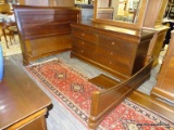 MAHOGANY QUEEN SIZE SLEIGH BED WITH WOOD RAILS.