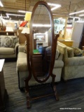 MAHOGANY CHEVAL MIRROR ON DEORATED STAND WITH METAL STRETCHER. MEASURES APPROX 66